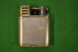 A Dunhill lighter.