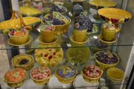 A quantity of Sarreguemines pottery to include bowls, preserve jars and covers, dishes etc.