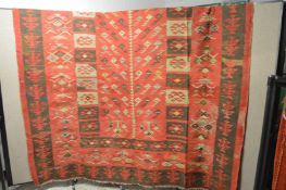 A large flat weave Kilim carpet (some damage) 290cm x 240cm.