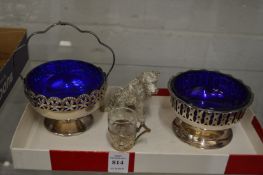 A small group of plated items.