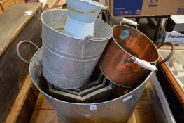 A galvanised planter and other items.