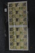 Two sheets of The Lord of The Rings first class stamps.