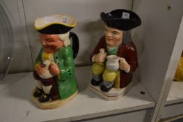 A Ralph Wood type toby jug and a musical toby jug.