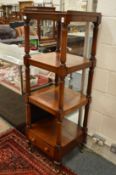 A 19th century mahogany four tier single drawer what-not.