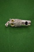 A novelty owl whistle.
