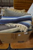 Various cushions and throws.