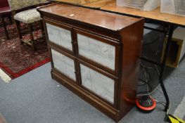A Minty mahogany two section four door bookcase.