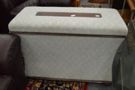 George Smith Limited, a mahogany and upholstered concave sided ottoman housing a rise and fall