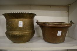 An Eastern engraved brass jardinere and a heavy copper and wrought iron preserve pot.