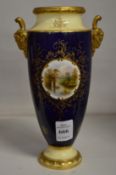 A Coalport porcelain vase painted with a scene of Warwick Castle.