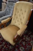 A Victorian mahogany framed open armchair.