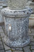 A classical style circular composite garden pedestal base.