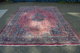 A modern crimson ground Bokara rug 200cm x127cm.