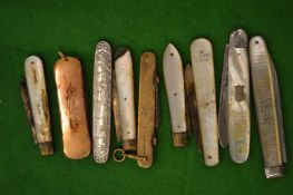 A group of silver bladed fruit knives, 9ct gold mounted pen knife etc.
