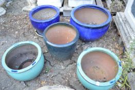 Five various torquoise and blue glazed garden planters.