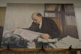 Russian school, Lenin seated at a desk studying papers, oil on canvas, stretchered but unframed