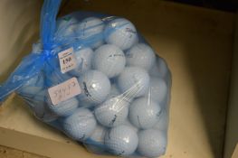 A bag of fifty Titleist golf balls.