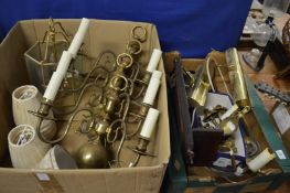 A set of four Dutch style brass two branch wall lights and other lighting.