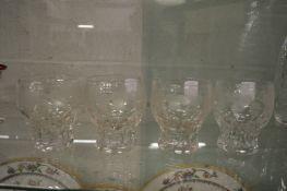 A set of four Walsh grape and vine engraved glass tumblers or wine glasses.