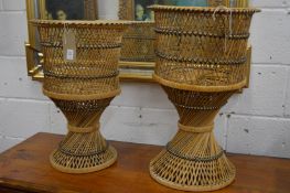 A pair if wicker jardinieres.