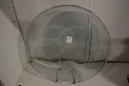 A Costa grey tinted glass circular dish.