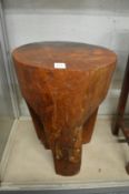 Kare design, a rustic wood stool.