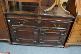 A 19th century oak chest with single drawer above a pair of cupboard doors.