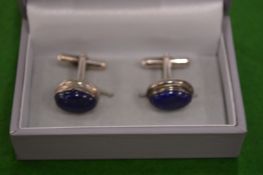 A pair of silver and lapis cufflinks, boxed.
