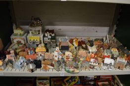 A large quantity of models of cottages and other buildings.