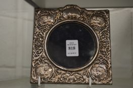 A good embossed silver photograph frame.