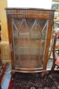 A mahogany display cabinet.
