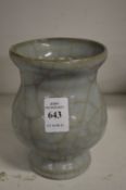 A Chinese small crackle glazed balister shaped vase.