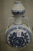 A Chinese blue and white moon flask.