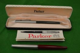A Parker 61 fountain pen, boxed and another similar.