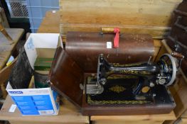 A Singer sewing machine etc.