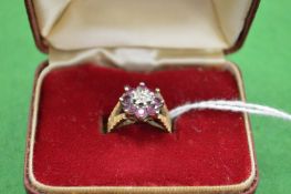 A small 9ct gold and gem set ring size H.