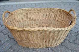A large wicker twin handled basket.