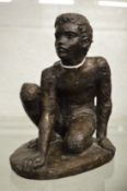 Karin Jonzen, bronze resin sculpture on a kneeling boy.
