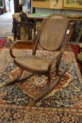 A Thonet child's Bentwood rocking chair.