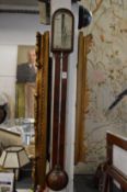 A George III mahogany stick barometer, the silvered dial signed Jas Lione, London.