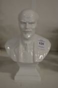 A small white porcelain bust of Lenin.