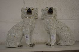 A pair of Staffordshire spaniels.