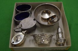 A collection of small silverware to include a circular bowl and oval mustard, small pierced basket