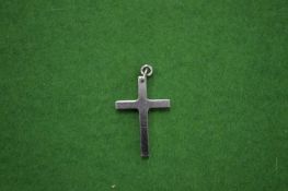 A stainless steel crucifix pendant.