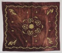 AN OTTOMAN GILT METAL THREADED RED VELVET TEXTILE, 90cm x 86cm.