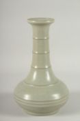 A CHINESE CELADON GLAZE BOTTLE VASE, 22.5cm high.