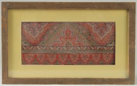 A FRAMED AND GLAZED INDIAN TEXTILE, 13cm x 28cm.