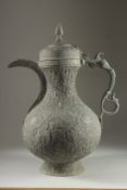A VERY LARGE PERSIAN QAJAR TINNED COPPER EWER, 60cm high.