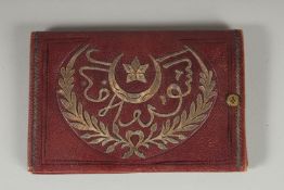 A FINE OTTOMAN SILVER EMBROIDERED LEATHER PURSE, 18cm x 12cm.