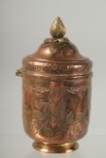 AN 18TH CENTURY OTTOMAN TURKISH TOMBAK GILDED COPPER LIDDED CUP, 14cm high.